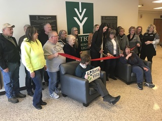 Ribbon cutting means open, officially